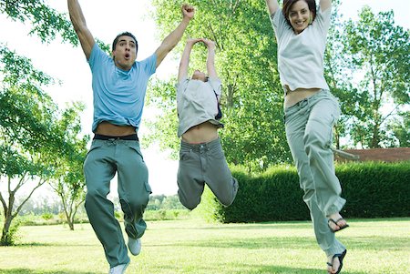 simsearch:633-01714195,k - Family outdoors jumping in air on a sunny day Stock Photo - Premium Royalty-Free, Code: 632-01380220