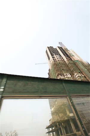 simsearch:632-01784591,k - China, Guangdong Province, Guangzhou, high rise under construction Foto de stock - Sin royalties Premium, Código: 632-01637834