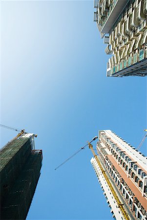 China, Guangdong Province, Guangzhou, high rises under construction Stock Photo - Premium Royalty-Free, Code: 632-01637924