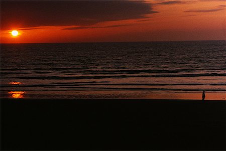 Sunset over ocean Stock Photo - Premium Royalty-Free, Code: 632-01638122