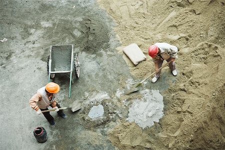 dig sand - Workers at construction site, high angle view Stock Photo - Premium Royalty-Free, Code: 632-01784553