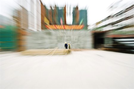 simsearch:632-01784605,k - Construction workers working at construction site, blurred motion Stock Photo - Premium Royalty-Free, Code: 632-01784629