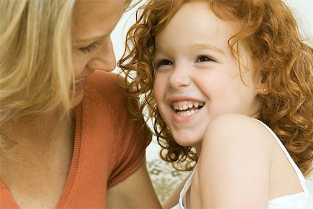 simsearch:695-03375963,k - Mother and daughter laughing together, close-up Stock Photo - Premium Royalty-Free, Code: 632-01785325