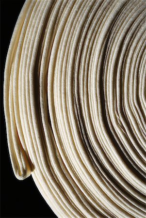 extreme close up - Coiled fabric, extreme close-up Stock Photo - Premium Royalty-Free, Code: 632-02038633