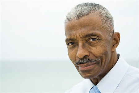 senior man african american - Businessman smiling at camera, portrait Stock Photo - Premium Royalty-Free, Code: 632-02038799