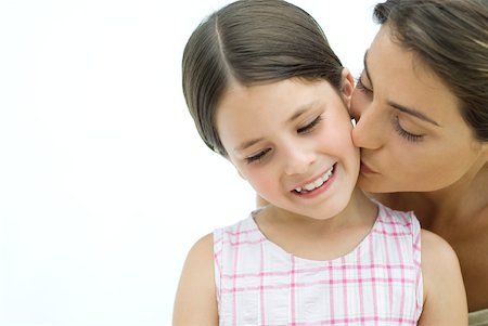 daughter kissing mother - Mother kissing daughter on the cheek, close-up Stock Photo - Premium Royalty-Free, Code: 632-02227960