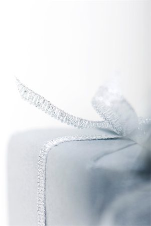 ribbon detail - Detail of gift wrapped present Stock Photo - Premium Royalty-Free, Code: 632-02345024