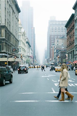 people walking in new york - Pedestrians crossing street in crosswalk at W 19th Street and 6th Avenue, Chelsea, New York, facing NE Stock Photo - Premium Royalty-Free, Code: 632-02345318