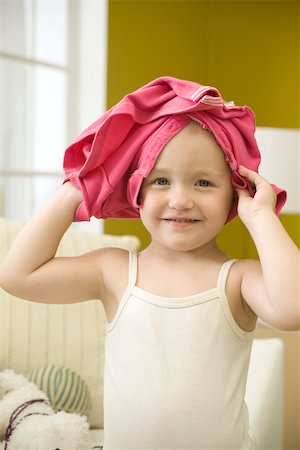 everyday - Toddler girl with shirt on head, portrait Stock Photo - Premium Royalty-Free, Code: 632-02645118