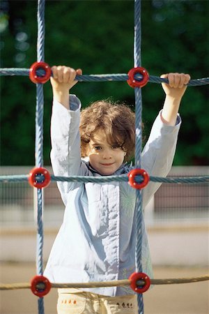 playground ropes - Little girl on rope climbing net, portrait Stock Photo - Premium Royalty-Free, Code: 632-02690106