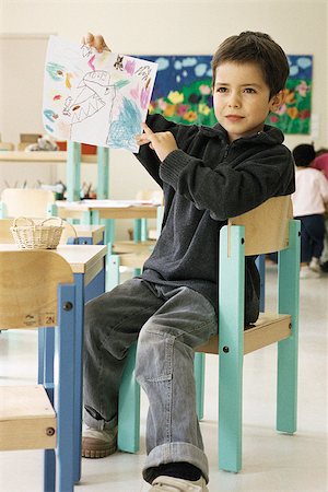 elementary drawing pictures - Boy showing drawing in class room Stock Photo - Premium Royalty-Free, Code: 632-02690154