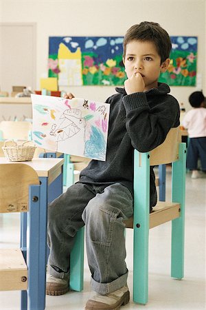 simsearch:632-03501053,k - Boy holding up drawing in class room Stock Photo - Premium Royalty-Free, Code: 632-02690155