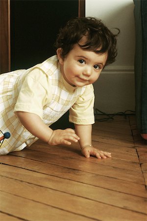 person on all four - Little girl crawling on floor Stock Photo - Premium Royalty-Free, Code: 632-02744767