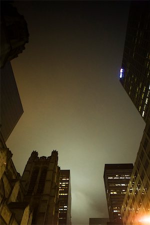 pictures of new york city buildings night - Foggy night view of high rise buildings, church Stock Photo - Premium Royalty-Free, Code: 632-02885217