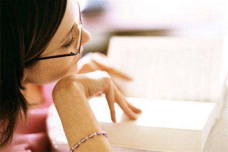 reading glasses top view - Woman reading book, close-up Stock Photo - Premium Royalty-Free, Code: 632-03027066