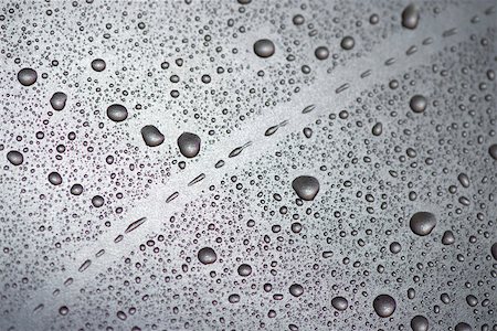 Water droplets on surface Stock Photo - Premium Royalty-Free, Code: 632-03027540