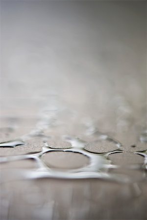 surface - Gouttelettes d'eau sur la surface, extreme close-up Photographie de stock - Premium Libres de Droits, Code: 632-03027558