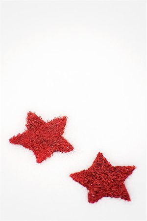 Red stars placed on snow Stock Photo - Premium Royalty-Free, Code: 632-03027591