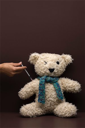 flu shot - Teddy bear getting a shot Stock Photo - Premium Royalty-Free, Code: 632-03083390