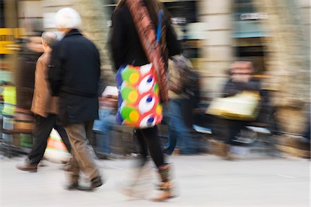 pedestrian side - Pedestrians walking on sidewalk, blurred Stock Photo - Premium Royalty-Free, Code: 632-03083495