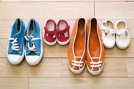 shoes lined up in a row - Family's shoes lined up together Stock Photo - Premium Royalty-Free, Code: 632-03083584