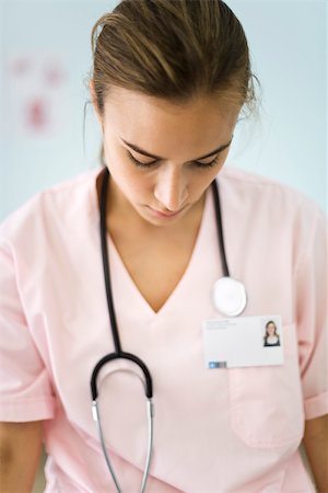 Nurse with head down Stock Photo - Premium Royalty-Free, Code: 632-03193454