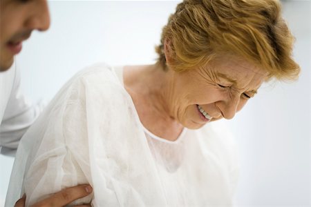 forlorn older woman - Doctor consoling upset patient, cropped Stock Photo - Premium Royalty-Free, Code: 632-03193468