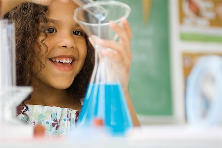 erlenmeyer flask photography - Little girl transferring liquid from test tube to beaker Stock Photo - Premium Royalty-Free, Code: 632-03193644