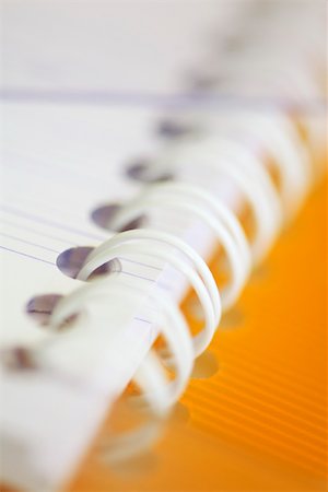 school supplies - Spiral notebook, extreme close-up Foto de stock - Sin royalties Premium, Código: 632-03193716