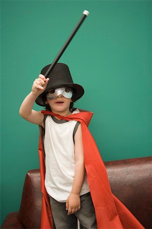 disappearing - Boy in costume pretending to be magician Stock Photo - Premium Royalty-Free, Code: 632-03424639