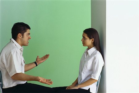 employee training - Man arguing with teenage girl Stock Photo - Premium Royalty-Free, Code: 632-03424692