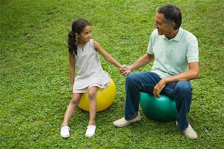 simsearch:614-08881231,k - Father and daughter together in park Stock Photo - Premium Royalty-Free, Code: 632-03424749