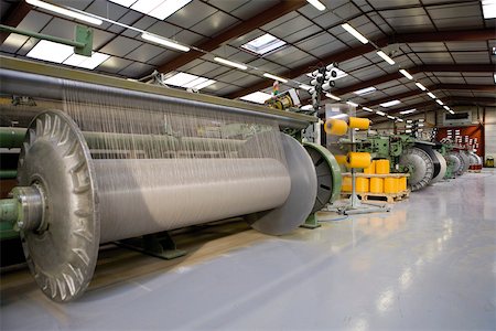 Fabric coating plant, weaving department, weaver's beam and loom Stock Photo - Premium Royalty-Free, Code: 632-03500529