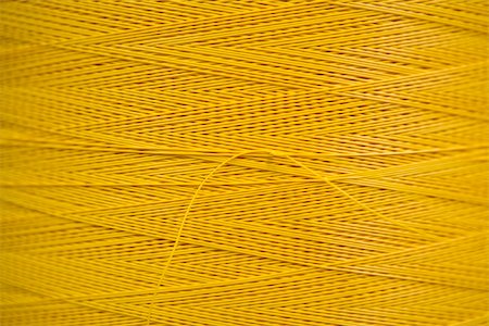 rhone-alpes - Fabric coating plant, recyclable composite textile weaving department, close-up of reel of coated thread Foto de stock - Sin royalties Premium, Código: 632-03500546