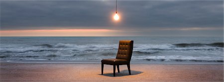 surreal - Light bulb illuminated over chair on beach at sunset Stock Photo - Premium Royalty-Free, Code: 632-03500617
