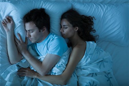 sleeping couple on the bed - Couple sleeping, woman embracing man Stock Photo - Premium Royalty-Free, Code: 632-03500845