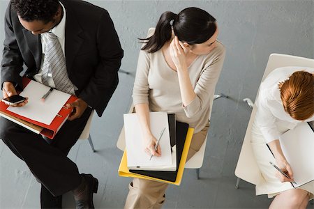 Professionals waiting for meeting to begin Stock Photo - Premium Royalty-Free, Code: 632-03500853