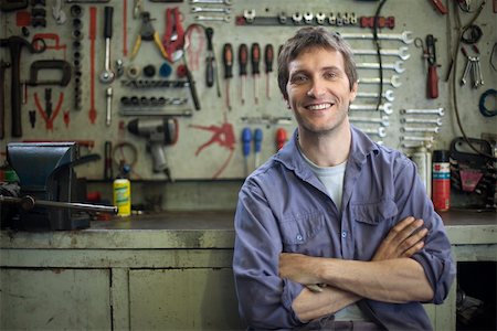 spanners hanging - Mechanic, portrait Stock Photo - Premium Royalty-Free, Code: 632-03500867