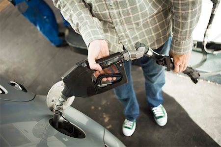 petrol & gas photos - Refueling at gas station Stock Photo - Premium Royalty-Free, Code: 632-03500902