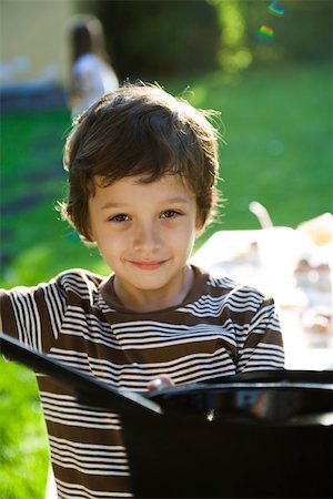 Boy with magic wand and magician's hat, portrait Stock Photo - Premium Royalty-Free, Code: 632-03500989