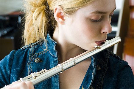 Flautist practicing Foto de stock - Sin royalties Premium, Código: 632-03501096