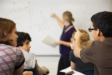 student whiteboard - Concept expliquant étudiant dans la classe Photographie de stock - Premium Libres de Droits, Code: 632-03516511