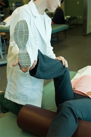 Patient receiving physical therapy treatment Stock Photo - Premium Royalty-Free, Code: 632-03516806