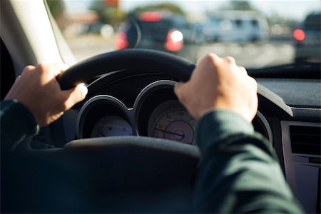 point of view hands - Driving with both hands on the steering wheel Stock Photo - Premium Royalty-Free, Code: 632-03516824