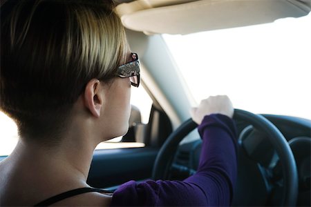 Woman driving, concentrating on road ahead Stock Photo - Premium Royalty-Free, Code: 632-03516834