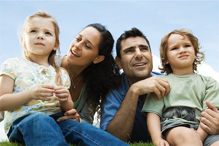 disheveled person - Family sitting together outdoors Stock Photo - Premium Royalty-Free, Code: 632-03516960