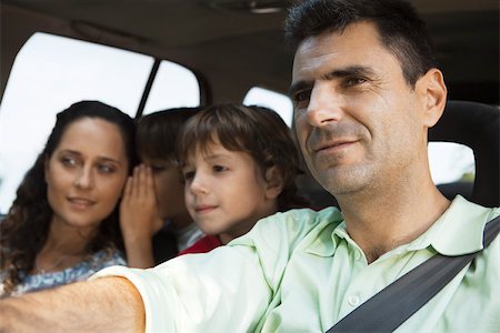 simsearch:632-03516970,k - Man driving with his family Stock Photo - Premium Royalty-Free, Code: 632-03517011