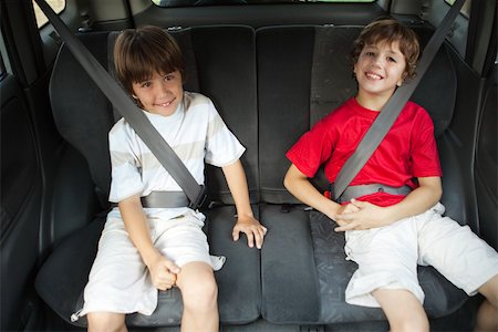 safety harness - Brothers sitting in car, portrait Stock Photo - Premium Royalty-Free, Code: 632-03517013