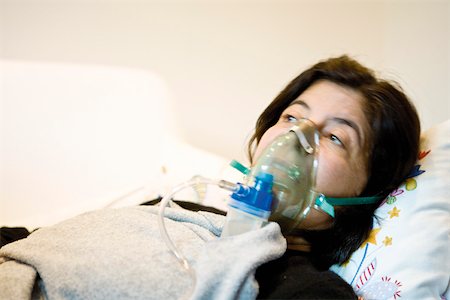 patient alone - Woman receiving oxygen treatment Stock Photo - Premium Royalty-Free, Code: 632-03629679