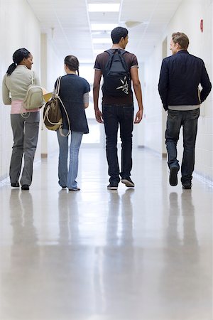people walking rear view - High school students walking down school corridor, rear view Stock Photo - Premium Royalty-Free, Code: 632-03629720
